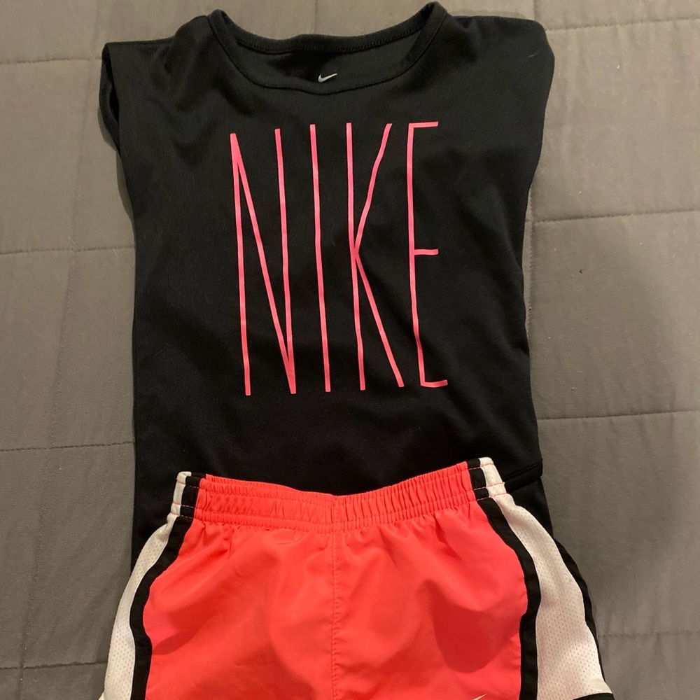 Pink and black Nike shorts and T-shirt